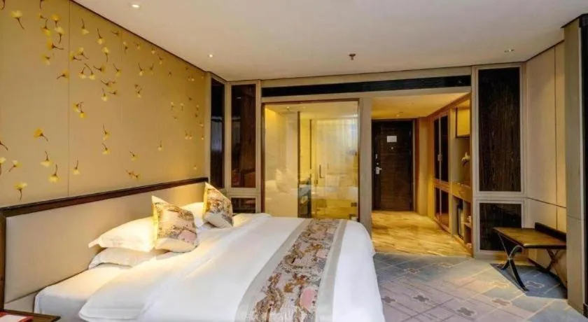 Bed in Dahe Jinjiang Hotel