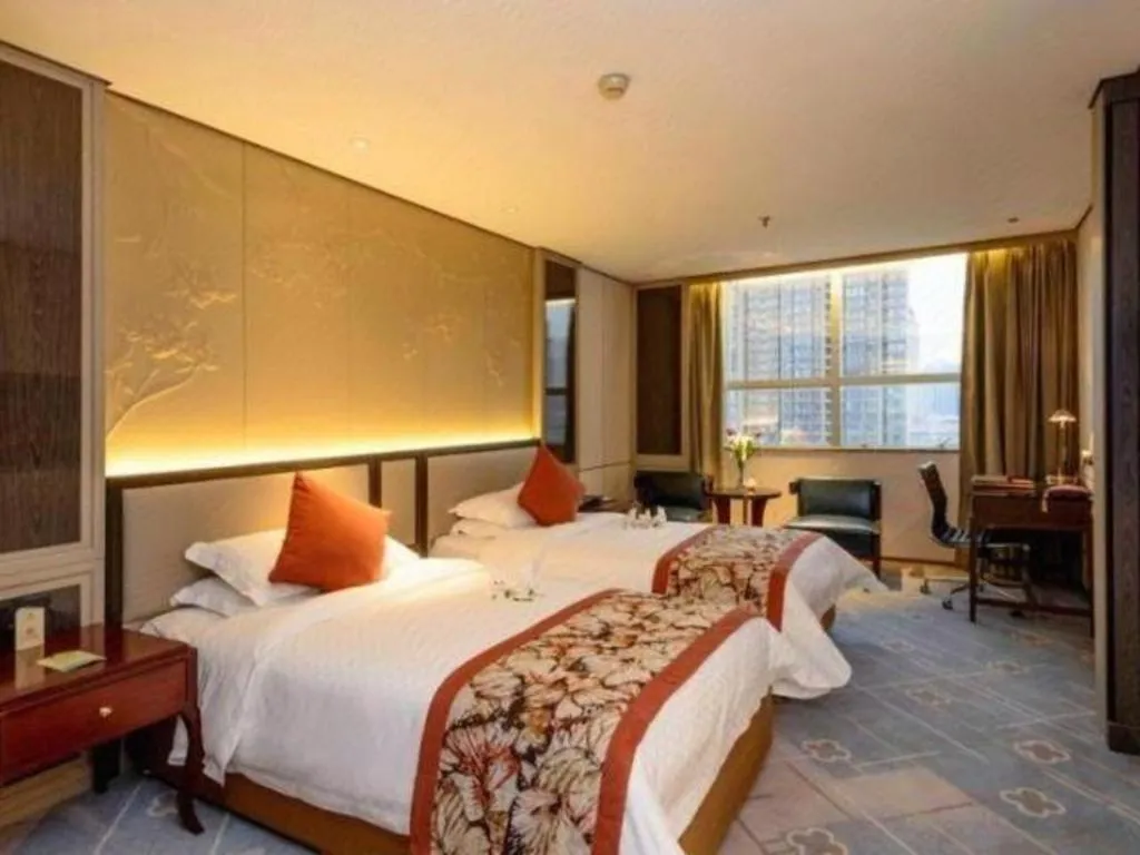 Bed in Dahe Jinjiang Hotel