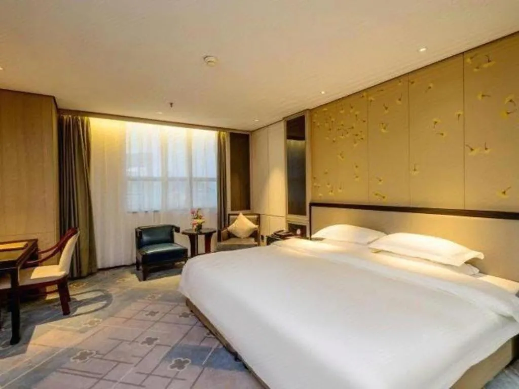 Bed in Dahe Jinjiang Hotel