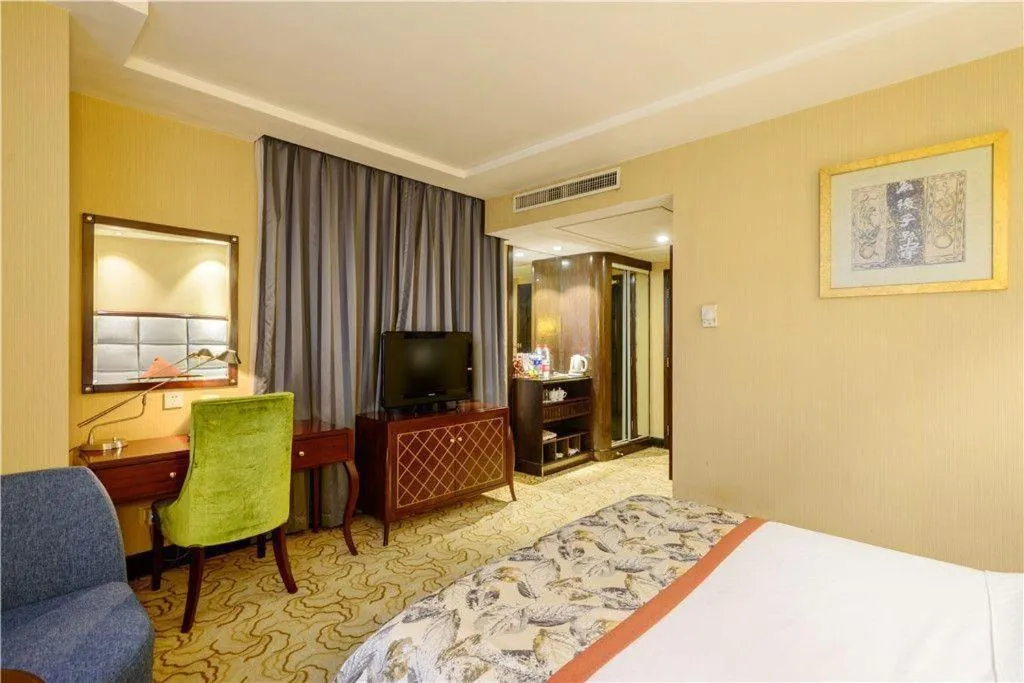 Bed in Dahe Jinjiang Hotel