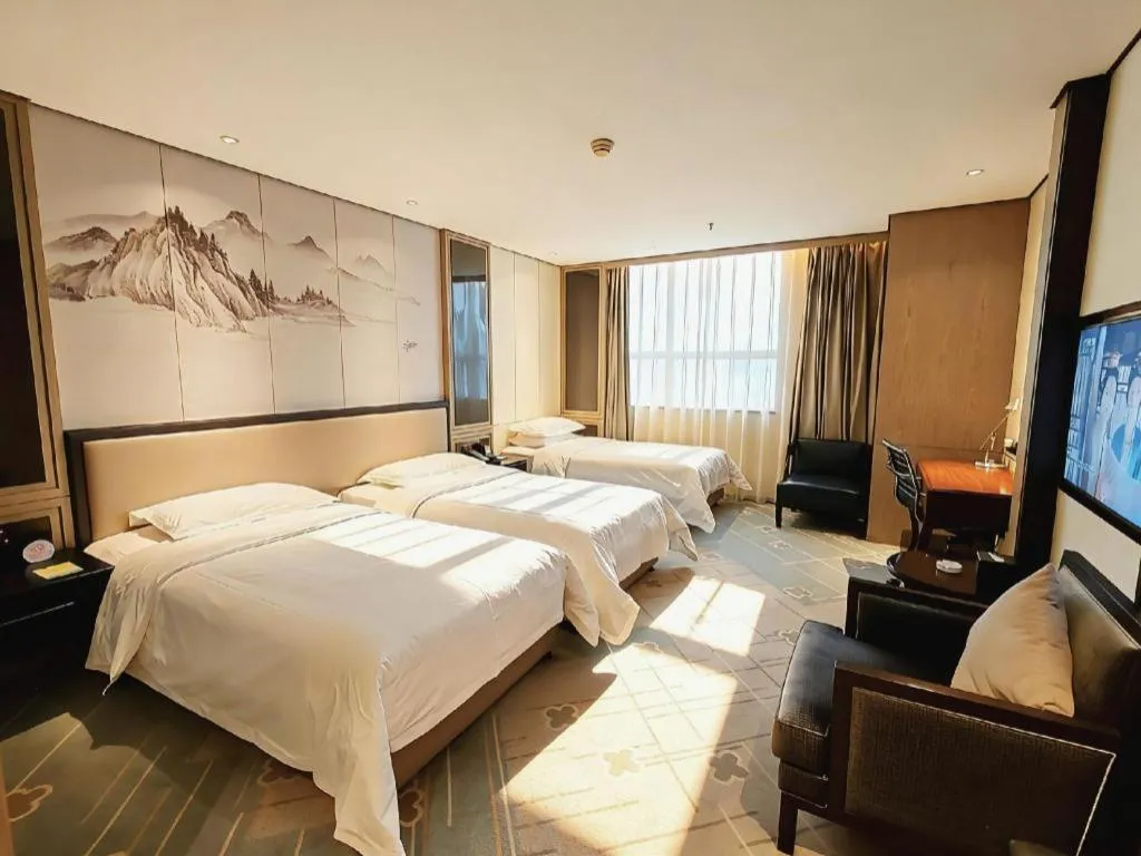Bed in Dahe Jinjiang Hotel