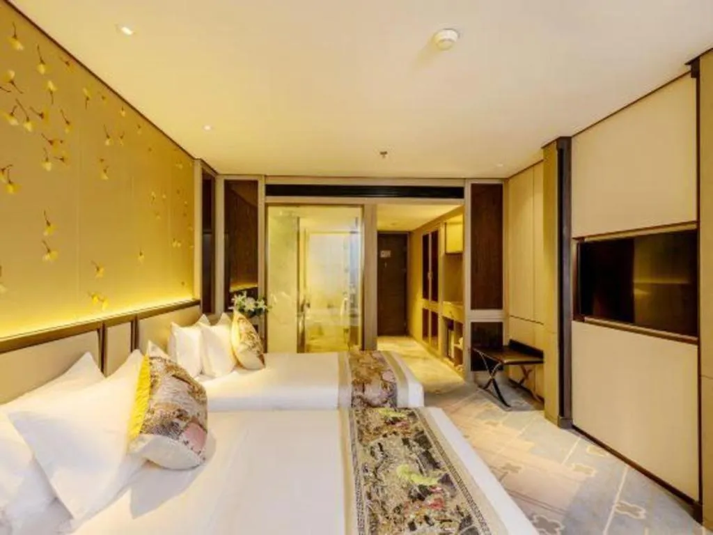 Bed in Dahe Jinjiang Hotel