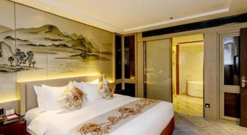 Bed in Dahe Jinjiang Hotel