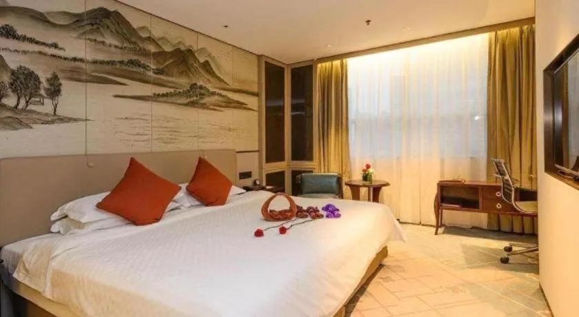 Bed in Dahe Jinjiang Hotel