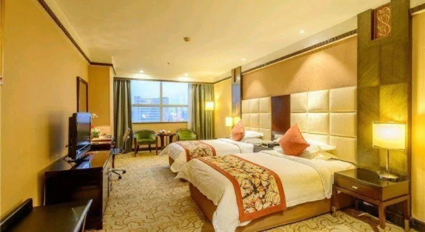 Bed in Dahe Jinjiang Hotel