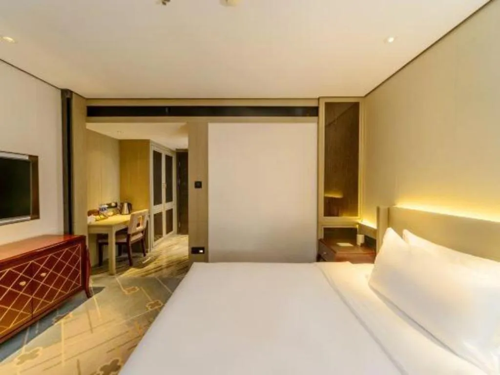 Bed in Dahe Jinjiang Hotel