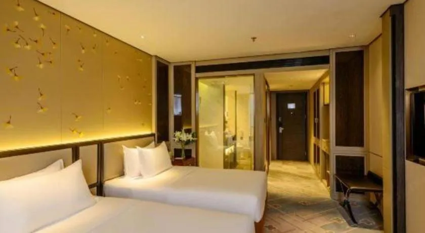 Bed in Dahe Jinjiang Hotel