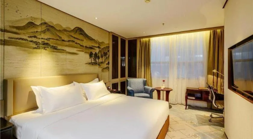 Bed in Dahe Jinjiang Hotel