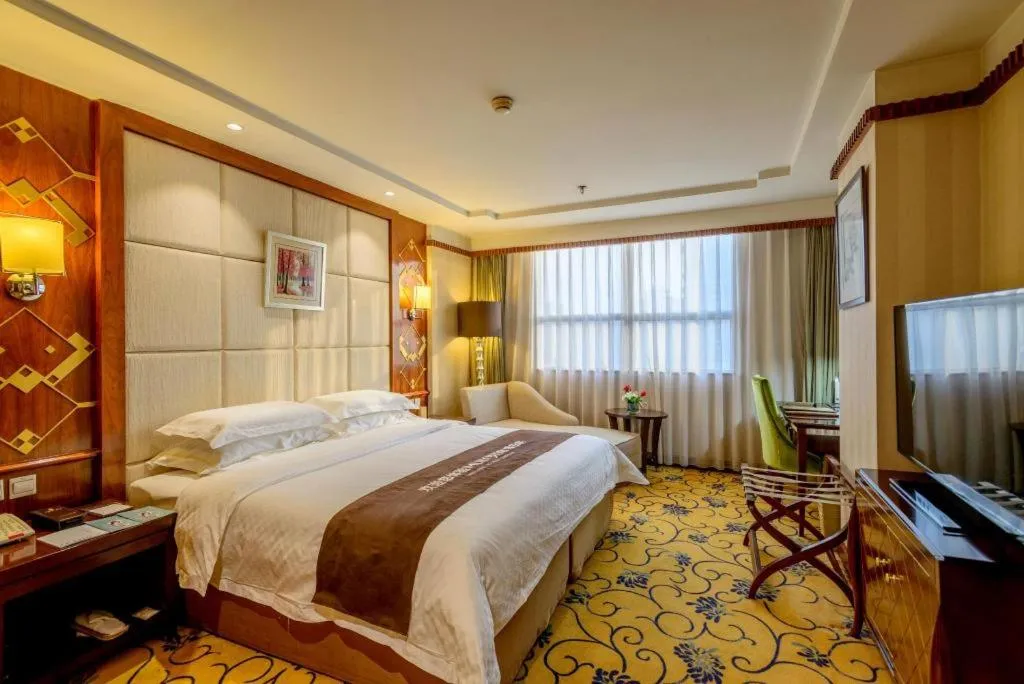 Bed in Dahe Jinjiang Hotel