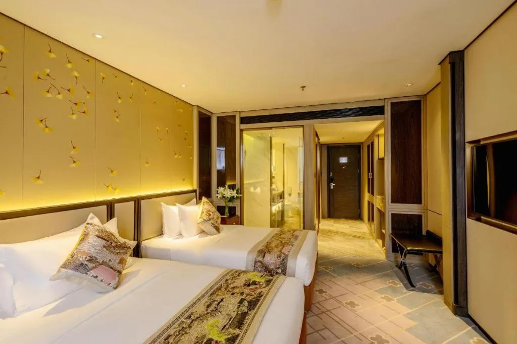 Bed in Dahe Jinjiang Hotel