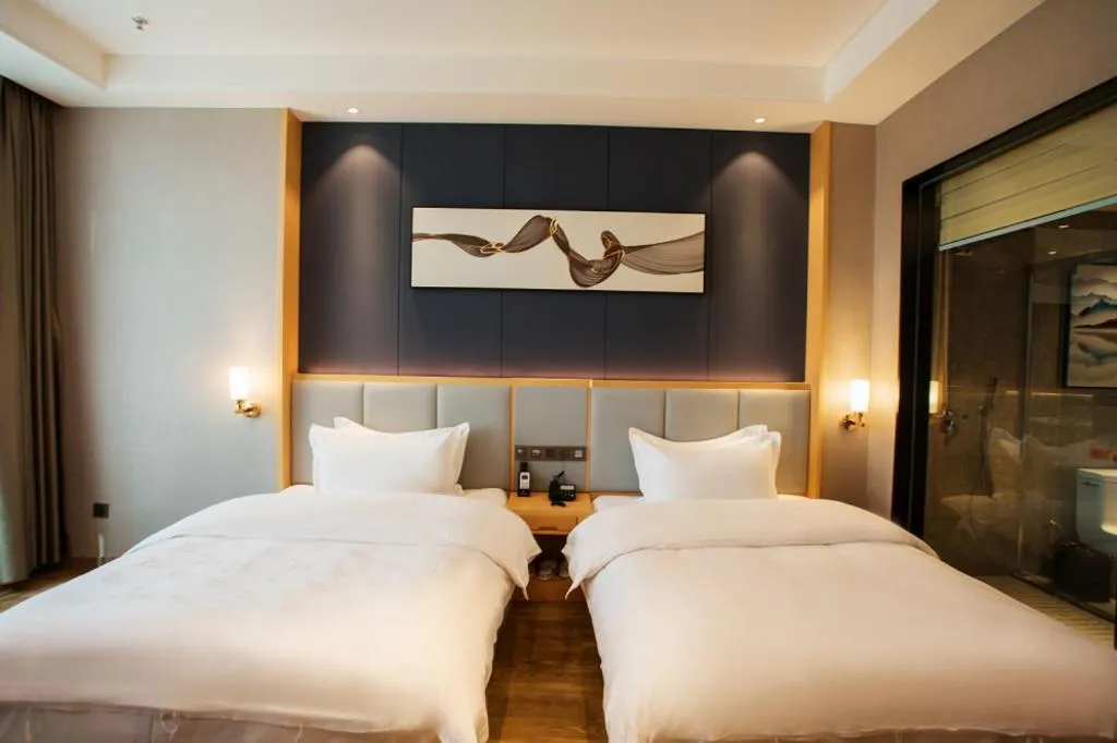 Bed in GreenTree Eastern Hotel Yunnan Shangri-La Yangtang Road