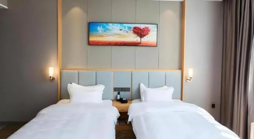 Bed in GreenTree Eastern Hotel Yunnan Shangri-La Yangtang Road