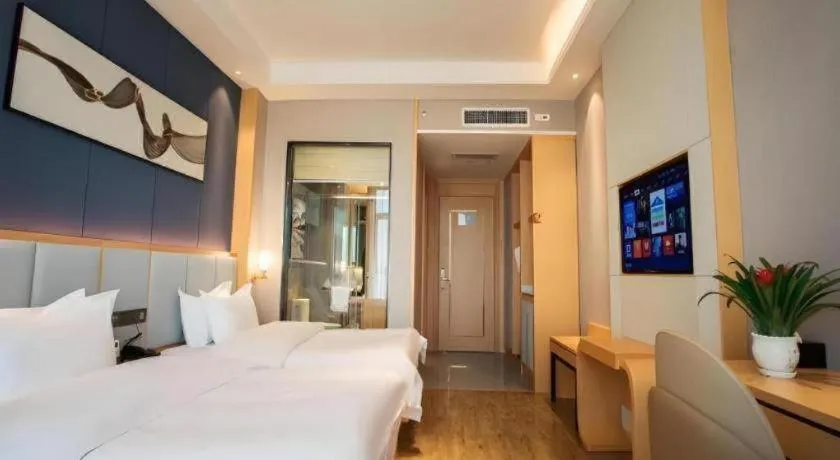 Bed in GreenTree Eastern Hotel Yunnan Shangri-La Yangtang Road