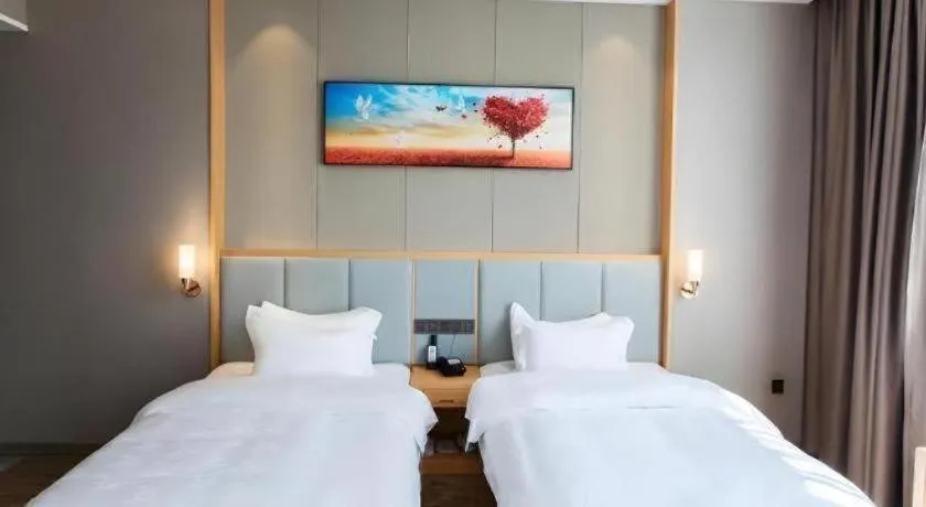 Bed in GreenTree Eastern Hotel Yunnan Shangri-La Yangtang Road