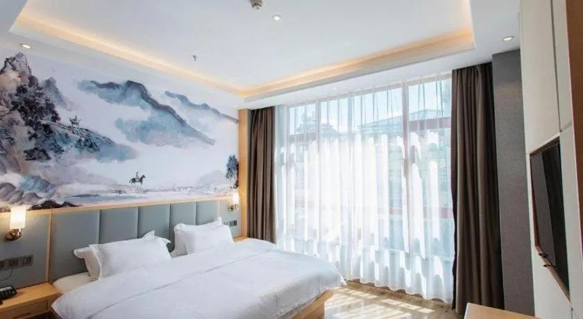 Bed in GreenTree Eastern Hotel Yunnan Shangri-La Yangtang Road
