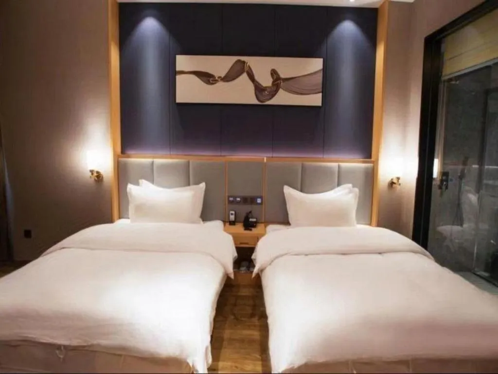 Bed in GreenTree Eastern Hotel Yunnan Shangri-La Yangtang Road