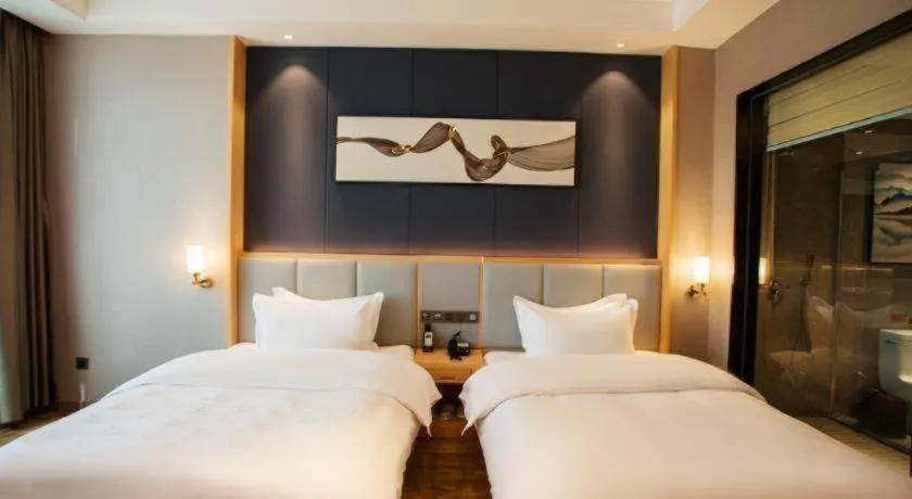 Bed in GreenTree Eastern Hotel Yunnan Shangri-La Yangtang Road