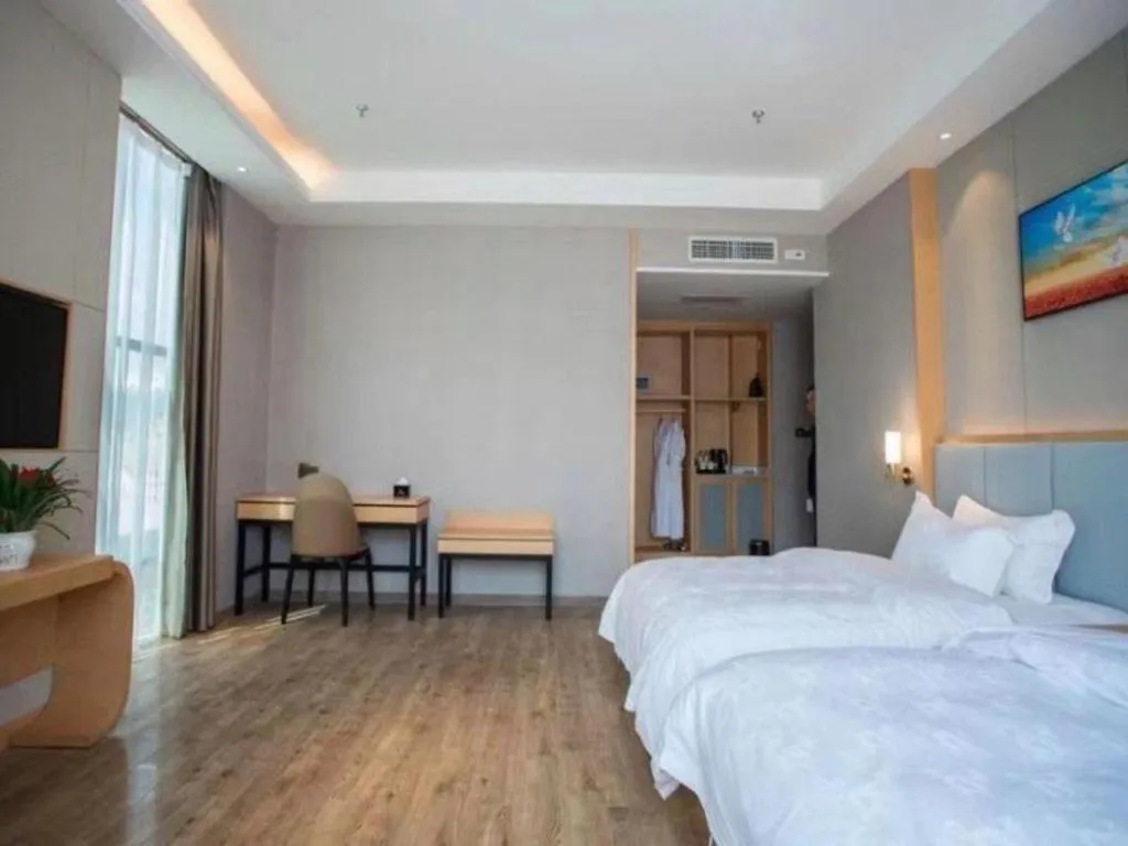 Bed in GreenTree Eastern Hotel Yunnan Shangri-La Yangtang Road