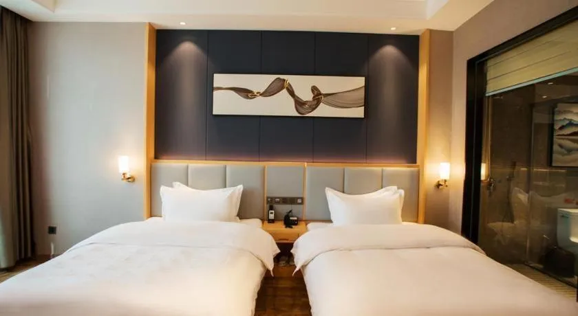 Bed in GreenTree Eastern Hotel Yunnan Shangri-La Yangtang Road