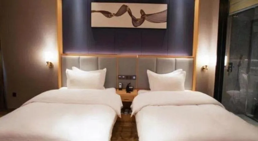 Bed in GreenTree Eastern Hotel Yunnan Shangri-La Yangtang Road