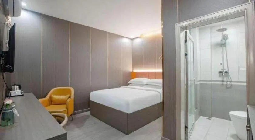 Bed in Shell Hotel Nanyang High-Speed Railway Station Jiangying Airport Huayaocheng
