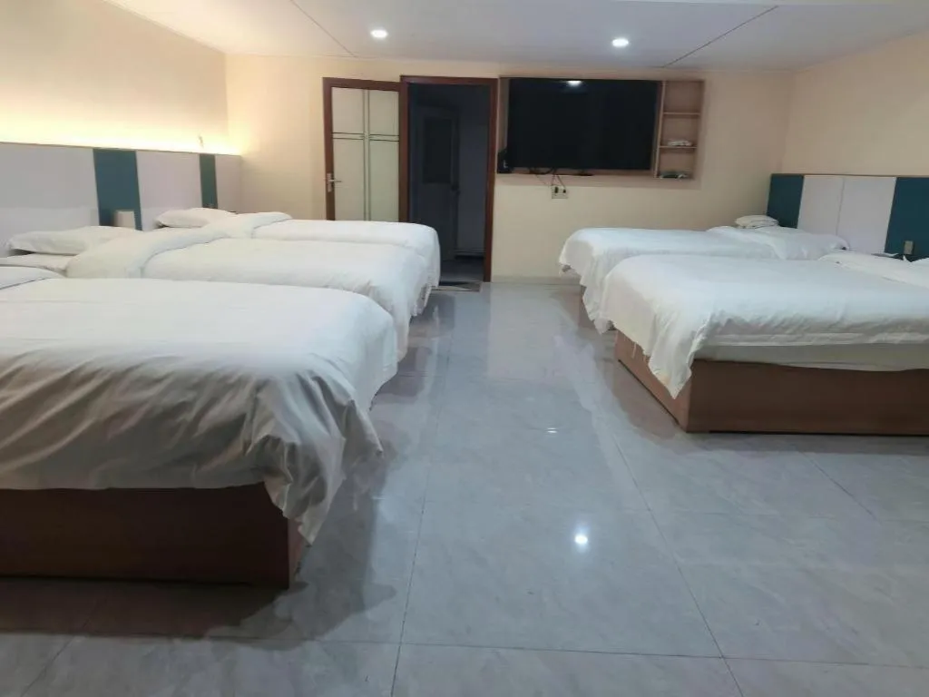 Bed in Shell Hotel Nanyang High-Speed Railway Station Jiangying Airport Huayaocheng
