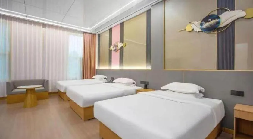 Bed in Shell Hotel Nanyang High-Speed Railway Station Jiangying Airport Huayaocheng
