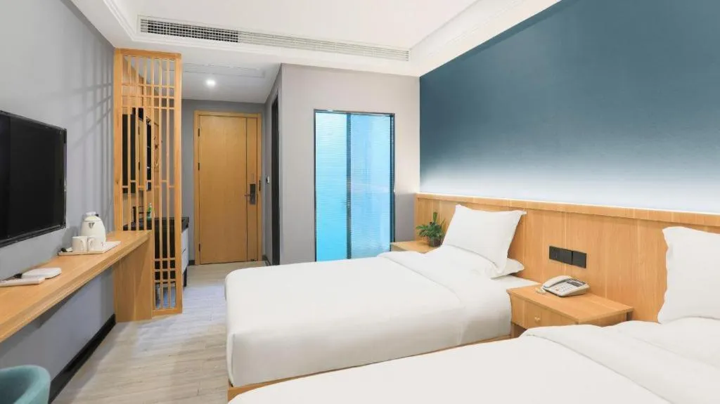 Bed in Shell Hotel Nanyang High-Speed Railway Station Jiangying Airport Huayaocheng