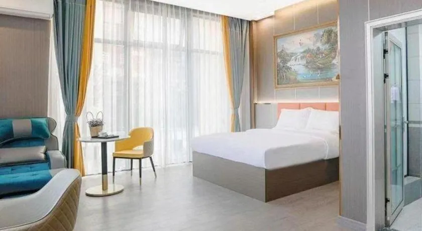 Bed in Shell Hotel Nanyang High-Speed Railway Station Jiangying Airport Huayaocheng