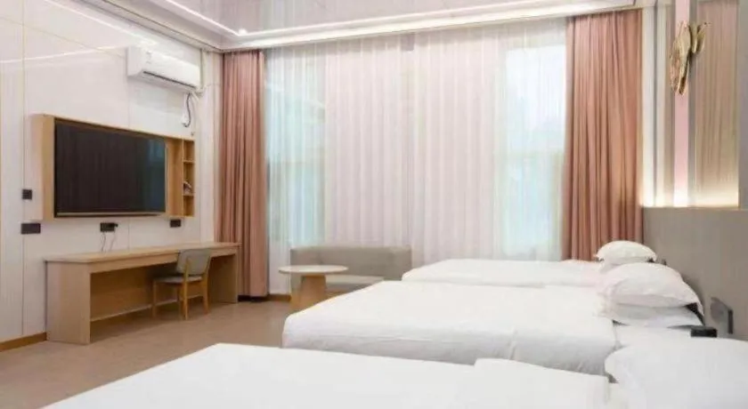 Bed in Shell Hotel Nanyang High-Speed Railway Station Jiangying Airport Huayaocheng