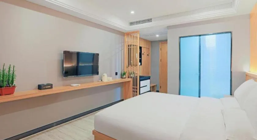 Bed in Shell Hotel Nanyang High-Speed Railway Station Jiangying Airport Huayaocheng