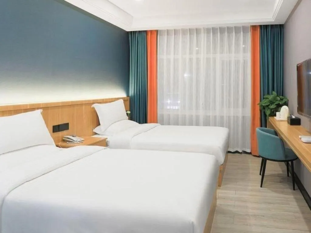 Bed in Shell Hotel Nanyang High-Speed Railway Station Jiangying Airport Huayaocheng