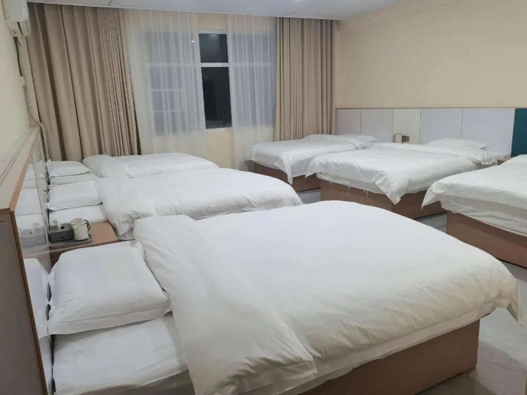 Bed in Shell Hotel Nanyang High-Speed Railway Station Jiangying Airport Huayaocheng