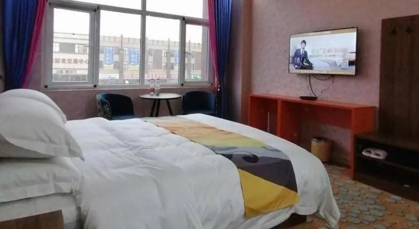 Bed in Shell Hotel Nanyang High-Speed Railway Station Jiangying Airport Huayaocheng