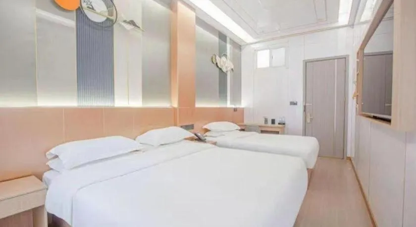 Bed in Shell Hotel Nanyang High-Speed Railway Station Jiangying Airport Huayaocheng