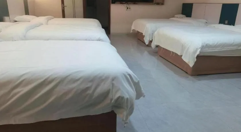 Bed in Shell Hotel Nanyang High-Speed Railway Station Jiangying Airport Huayaocheng