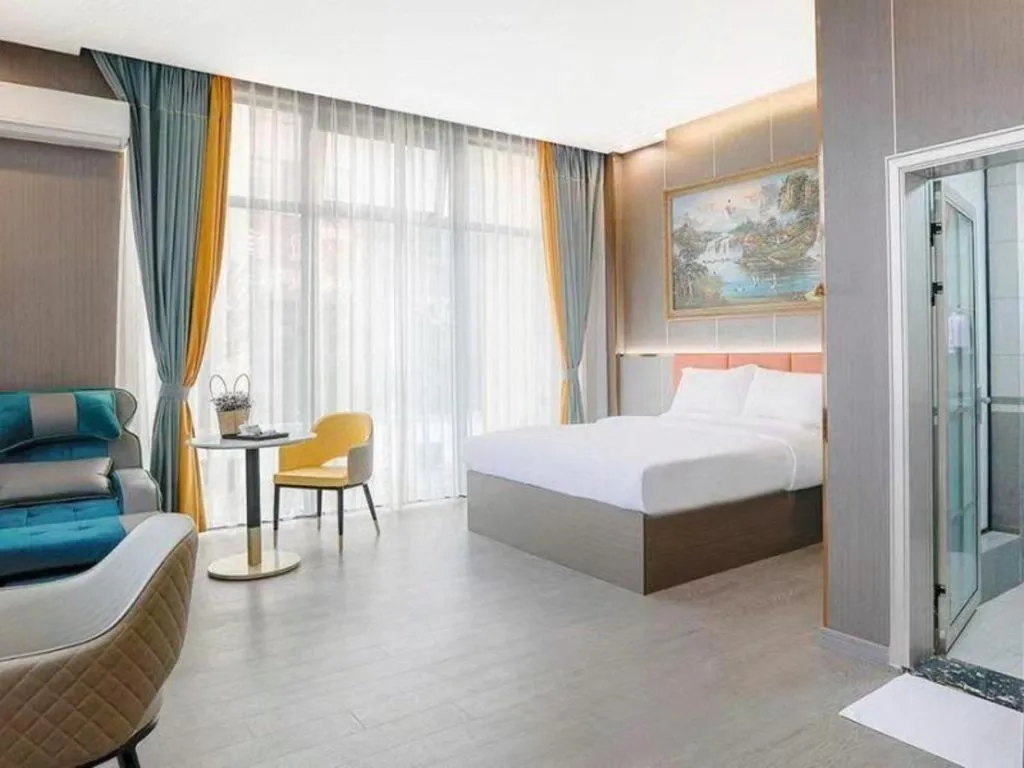 Bed in Shell Hotel Nanyang High-Speed Railway Station Jiangying Airport Huayaocheng