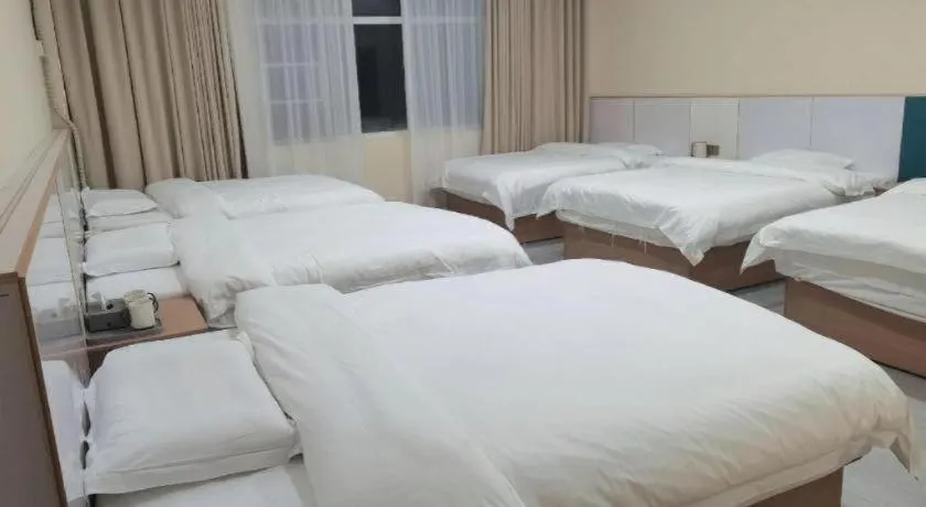 Bed in Shell Hotel Nanyang High-Speed Railway Station Jiangying Airport Huayaocheng