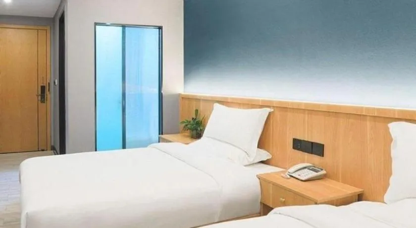 Bed in Shell Hotel Nanyang High-Speed Railway Station Jiangying Airport Huayaocheng