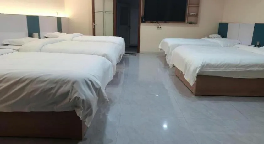 Bed in Shell Hotel Nanyang High-Speed Railway Station Jiangying Airport Huayaocheng
