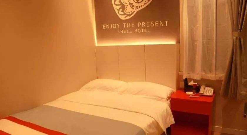 Bed in Shell Hotel Hebi Qi County Qihe Road