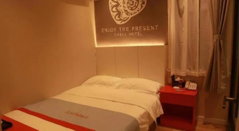 Bed in Shell Hotel Hebi Qi County Qihe Road