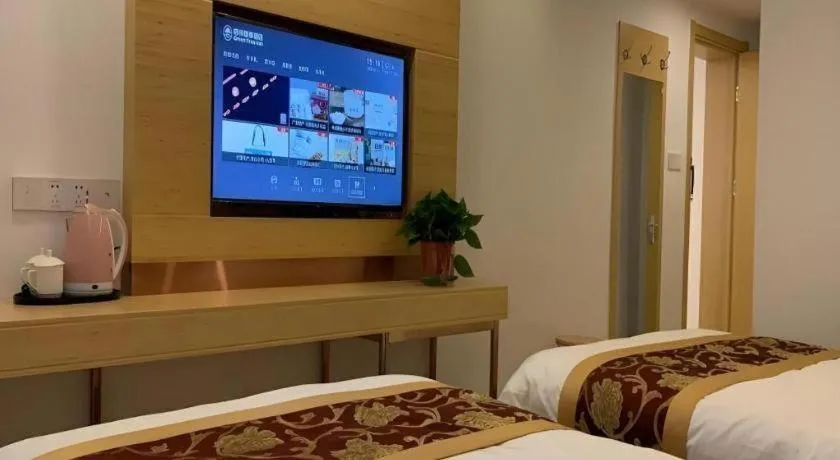 Bed in Shell Hotel Beijing Fangshan District Chengguan Metro Station