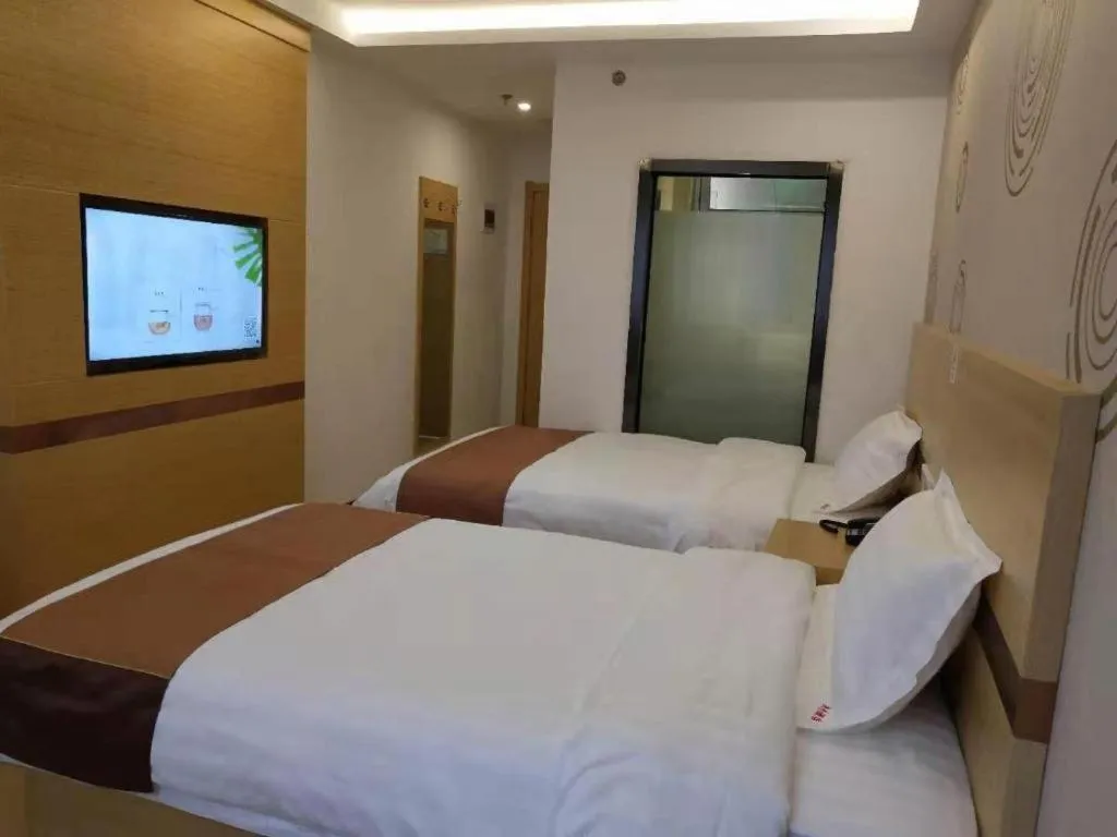 Bed in Shell Hotel Beijing Fangshan District Chengguan Metro Station