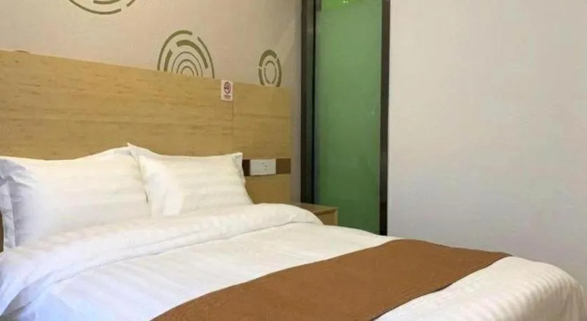 Bed in Shell Hotel Beijing Fangshan District Chengguan Metro Station