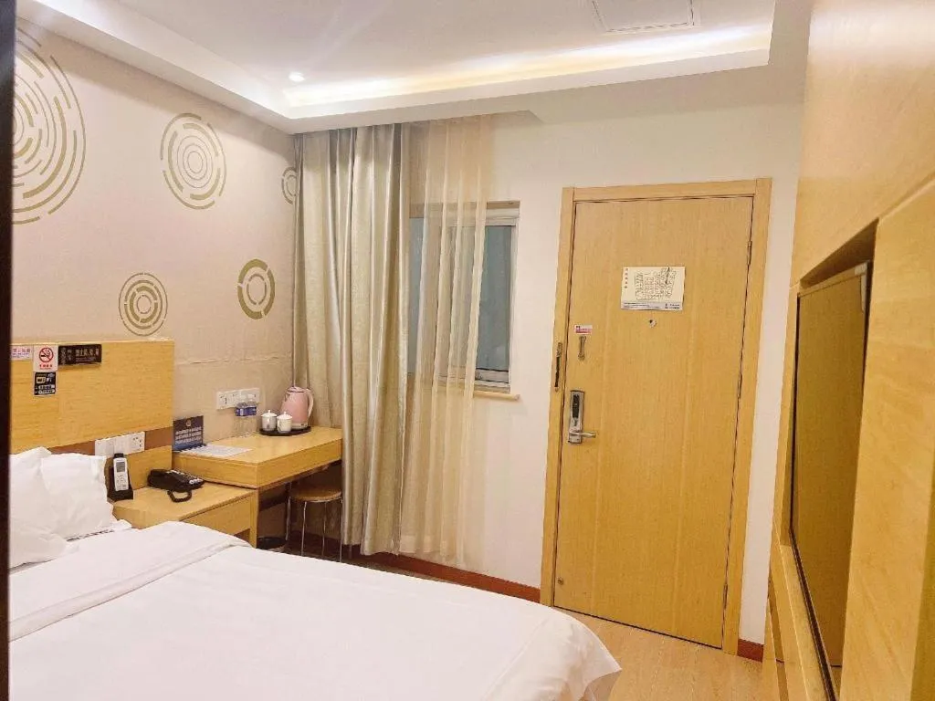 Bed in Shell Hotel Beijing Fangshan District Chengguan Metro Station