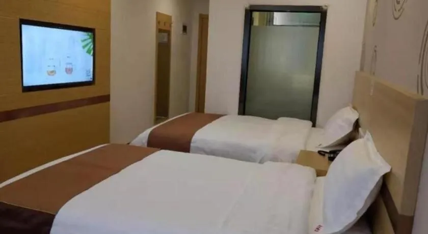 Bed in Shell Hotel Beijing Fangshan District Chengguan Metro Station