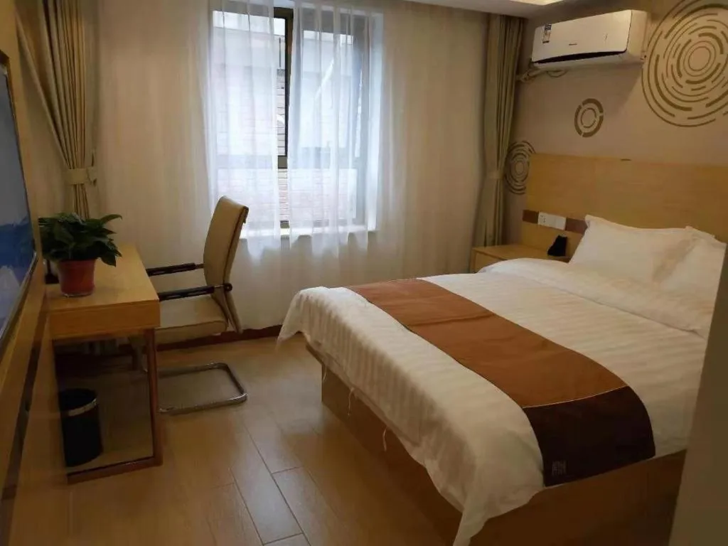 Bed in Shell Hotel Beijing Fangshan District Chengguan Metro Station