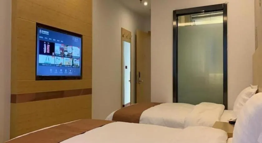 Bed in Shell Hotel Beijing Fangshan District Chengguan Metro Station