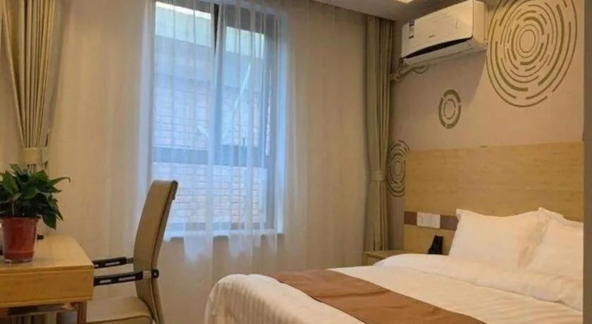 Bed in Shell Hotel Beijing Fangshan District Chengguan Metro Station